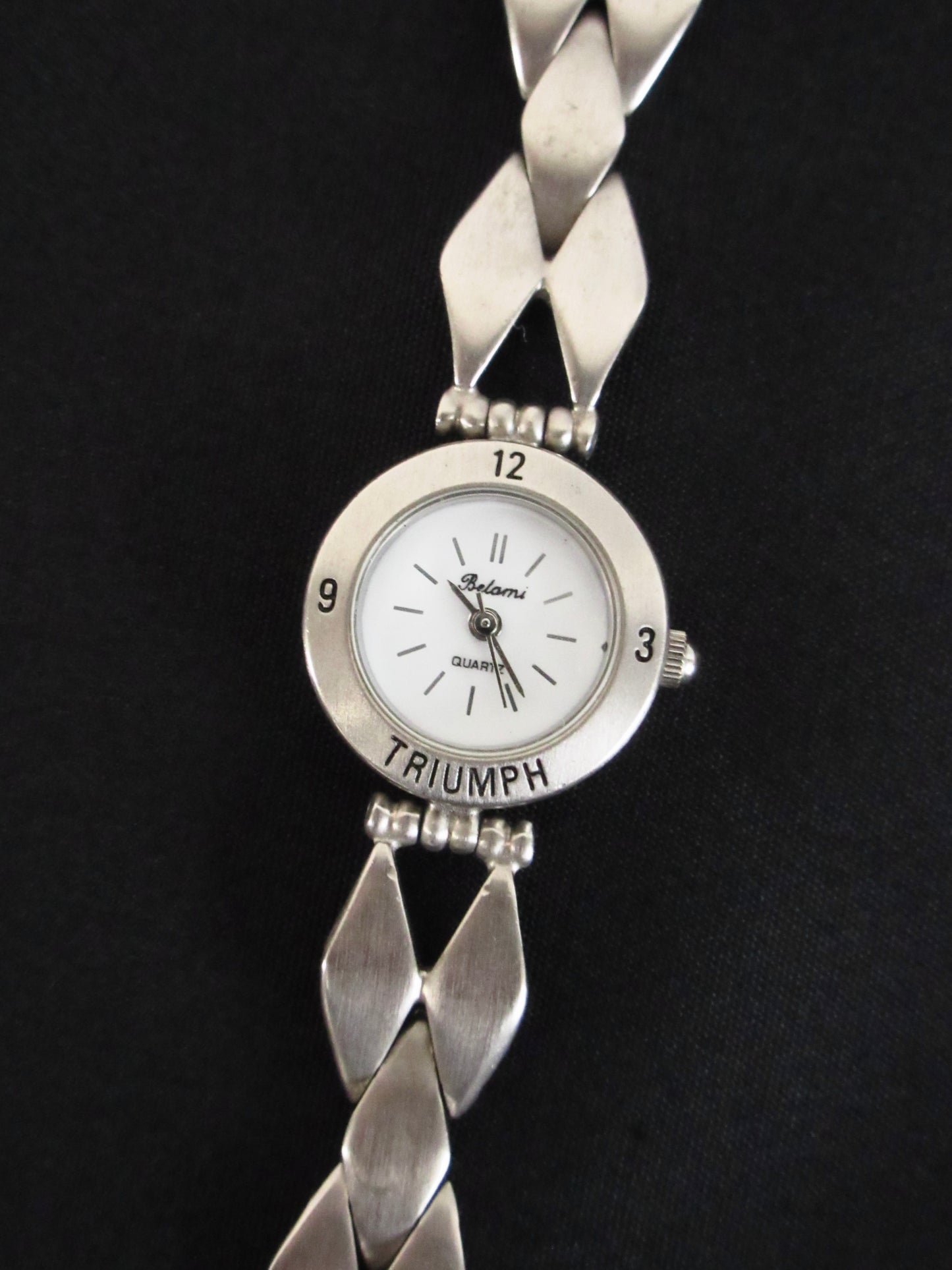 diamond shaped belt watch