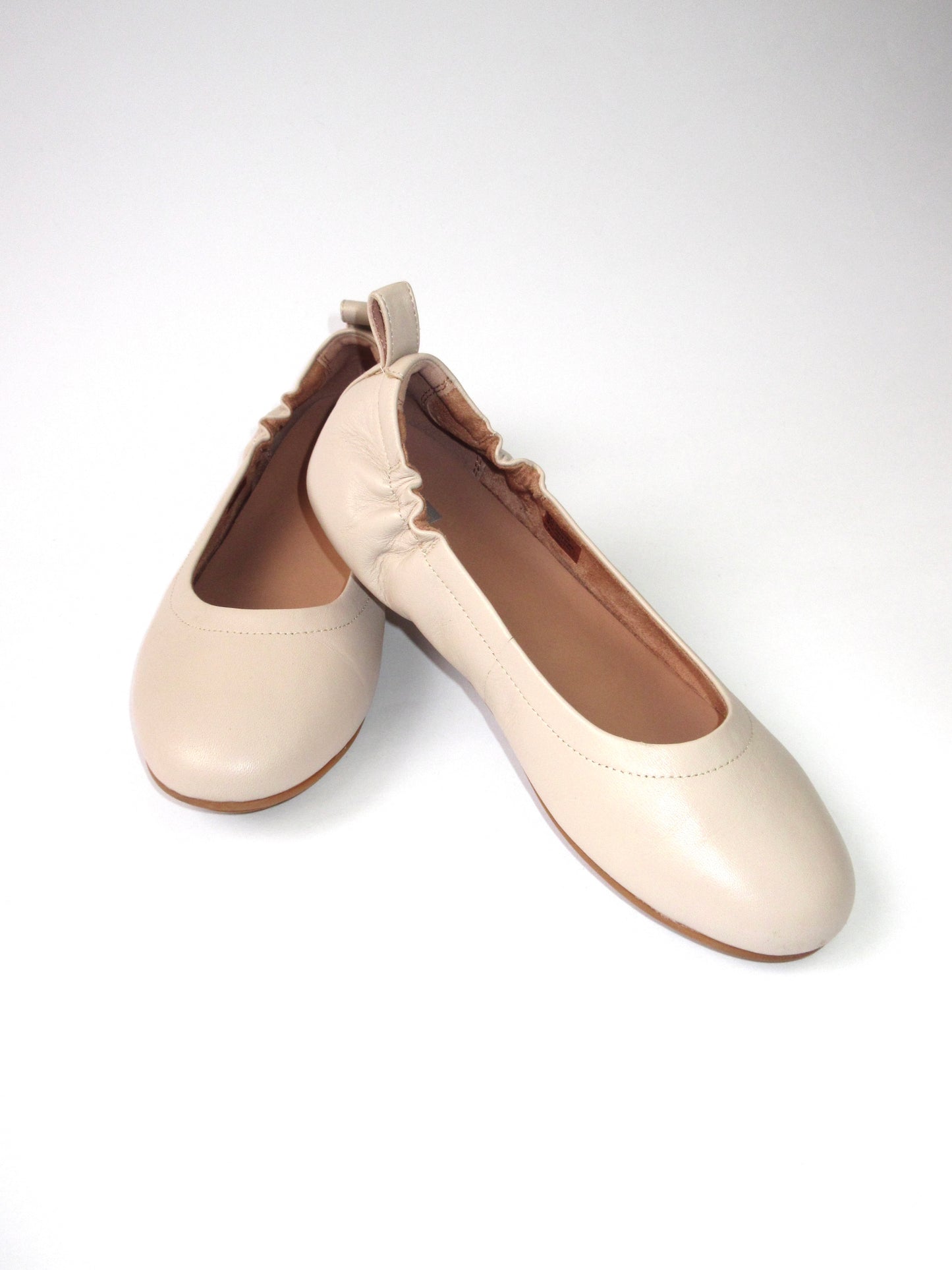 beige color flat shoes