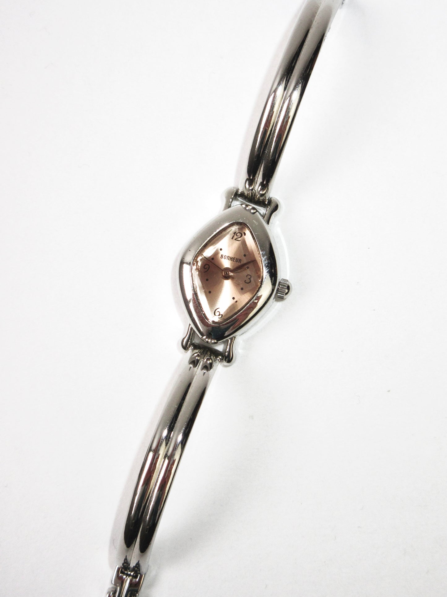 coral diamond shaped watch