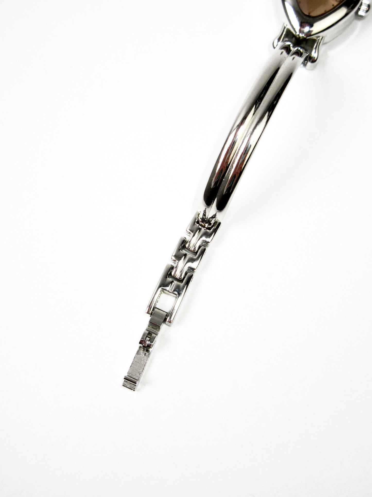 coral diamond shaped watch
