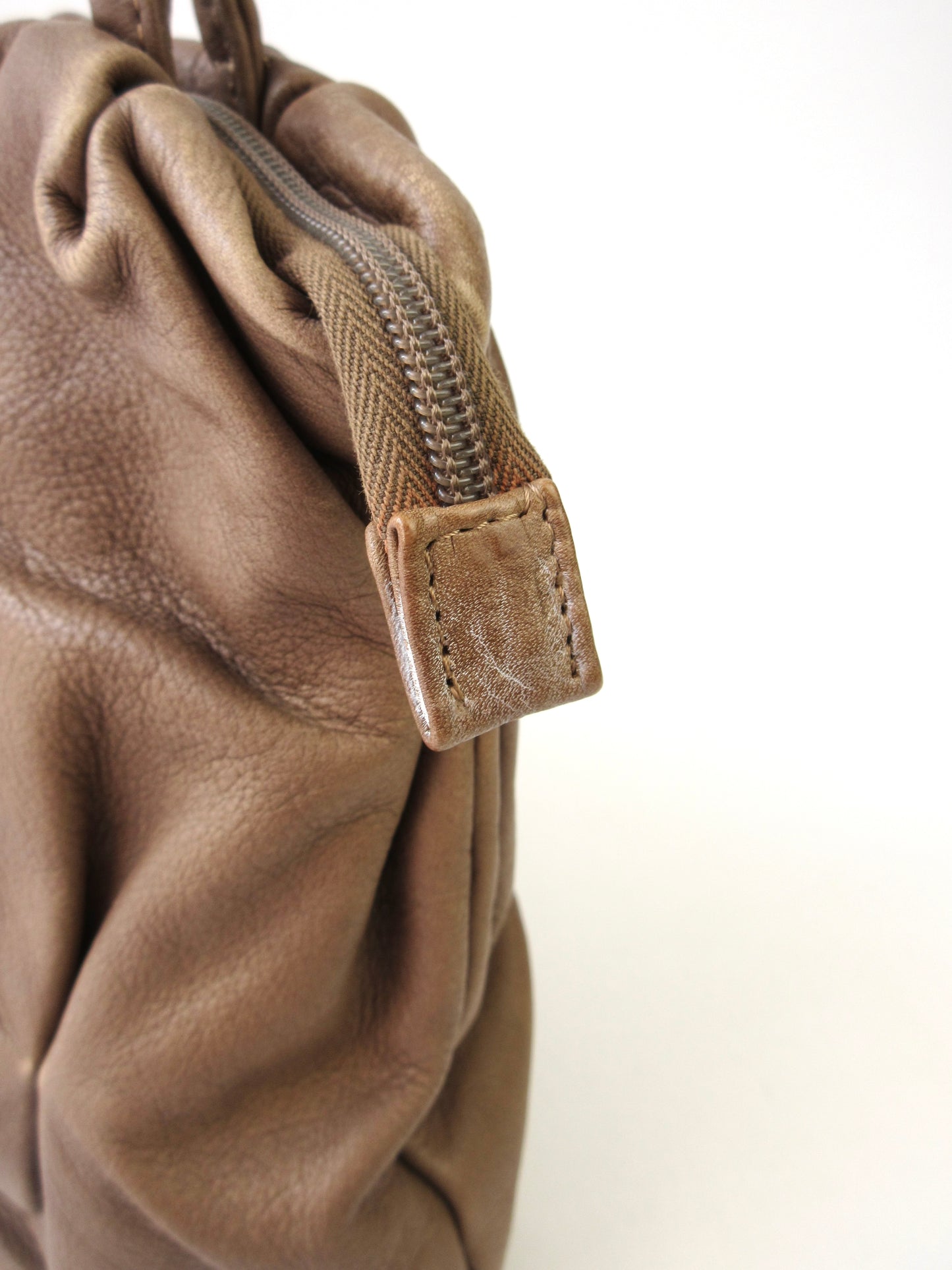 tucked leather shoulder bag
