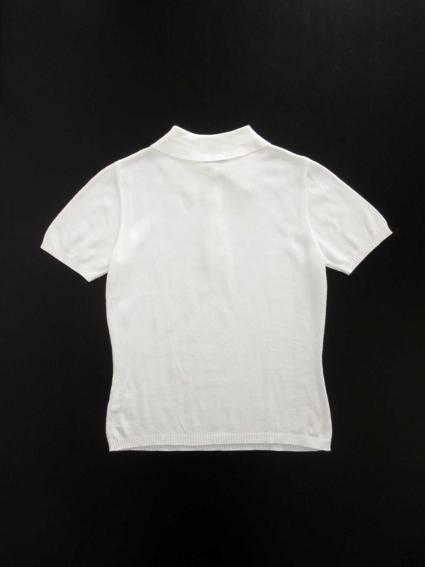white cotton polo shirt