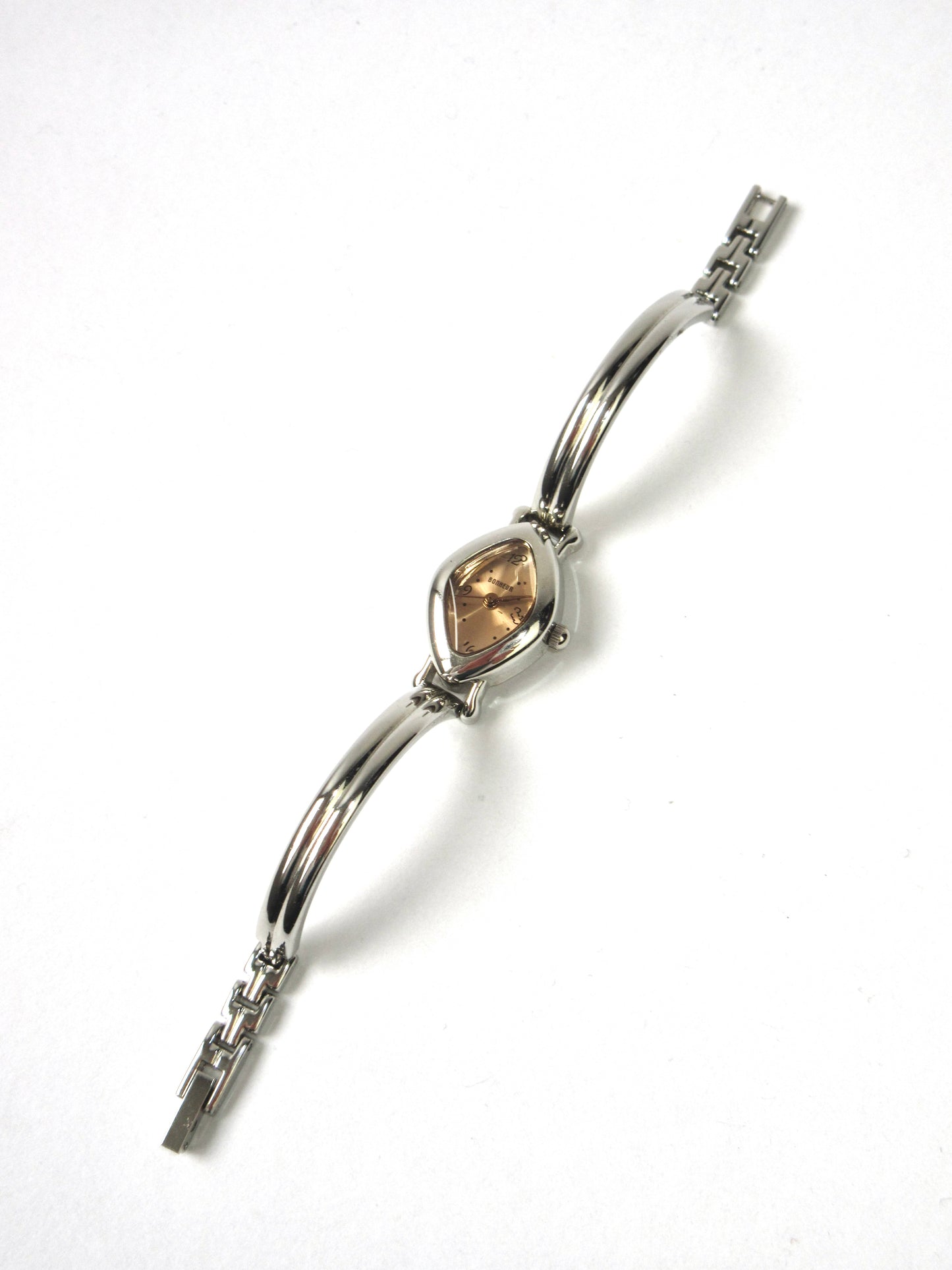 coral diamond shaped watch