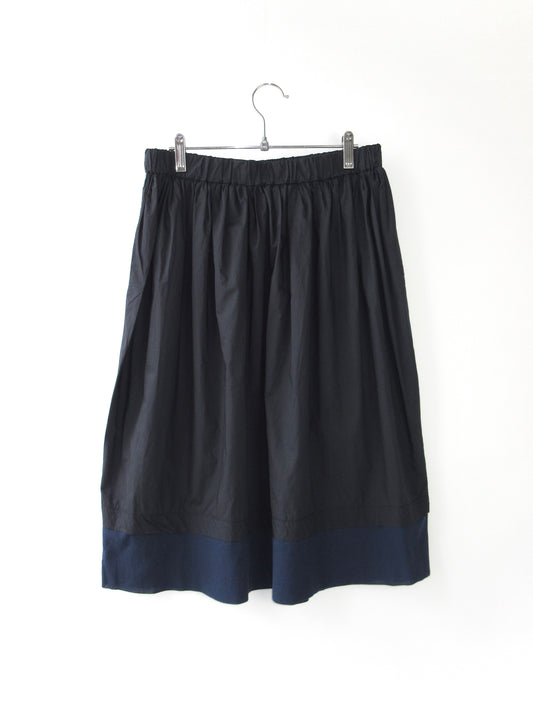 balloon silhouette navy skirt