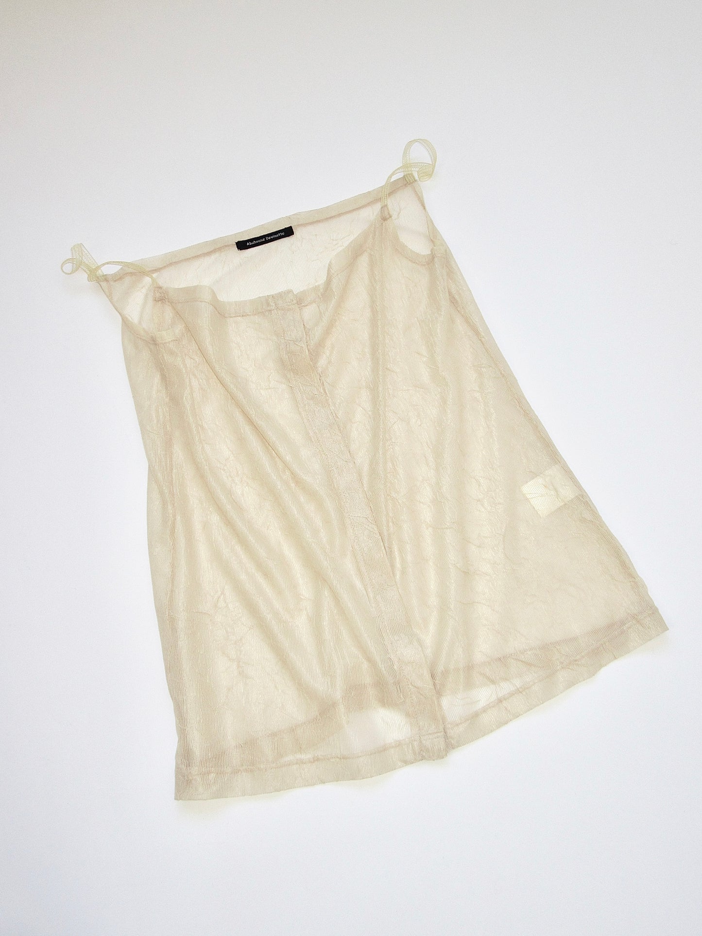 sheer sleeveless top