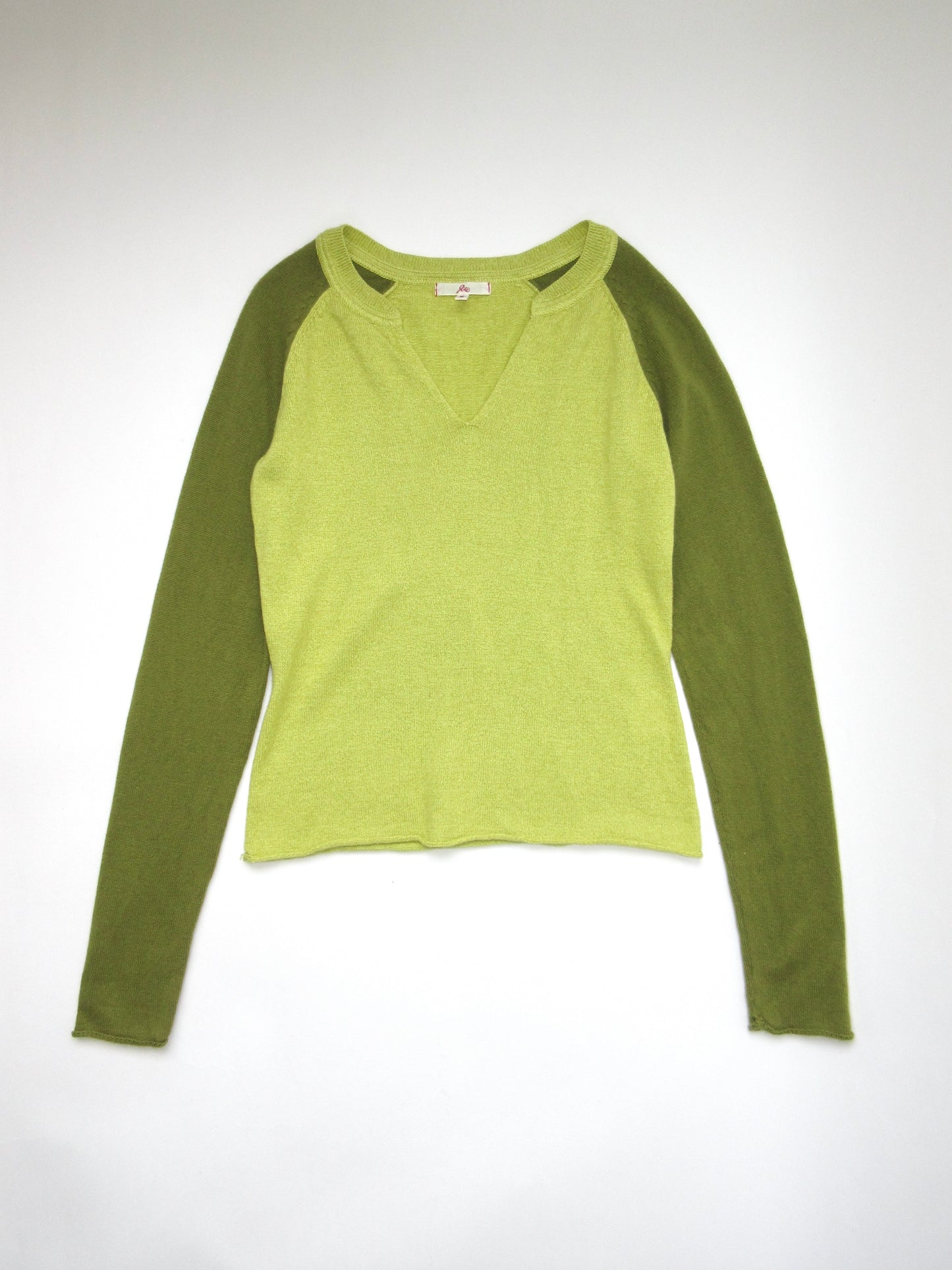 green color raglan sleeve knit top