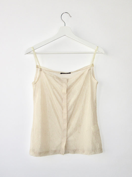 sheer sleeveless top