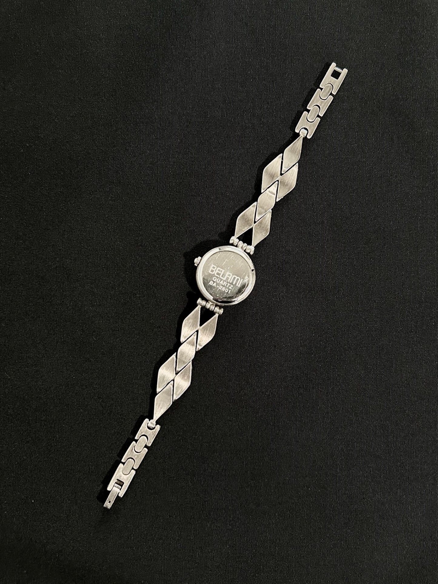 diamond shaped belt watch