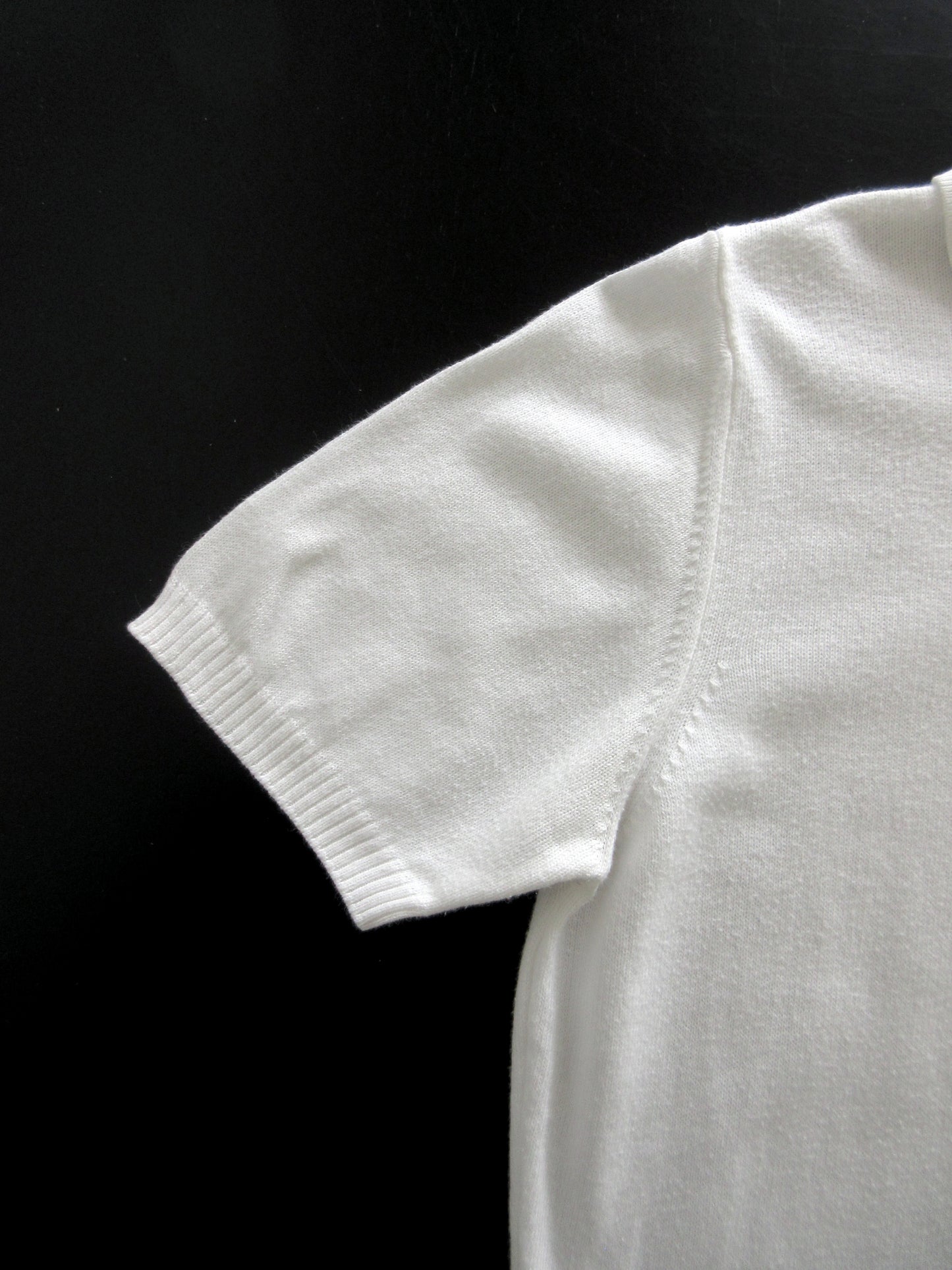 white cotton polo shirt