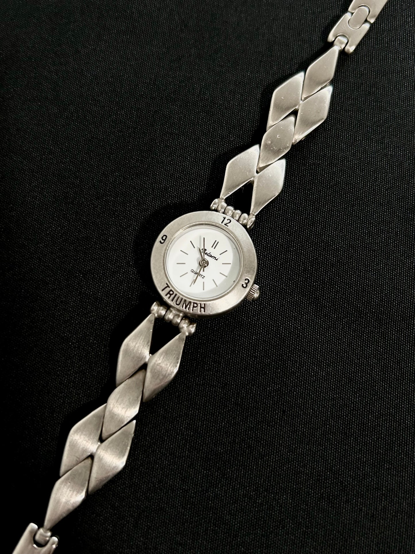 diamond shaped belt watch