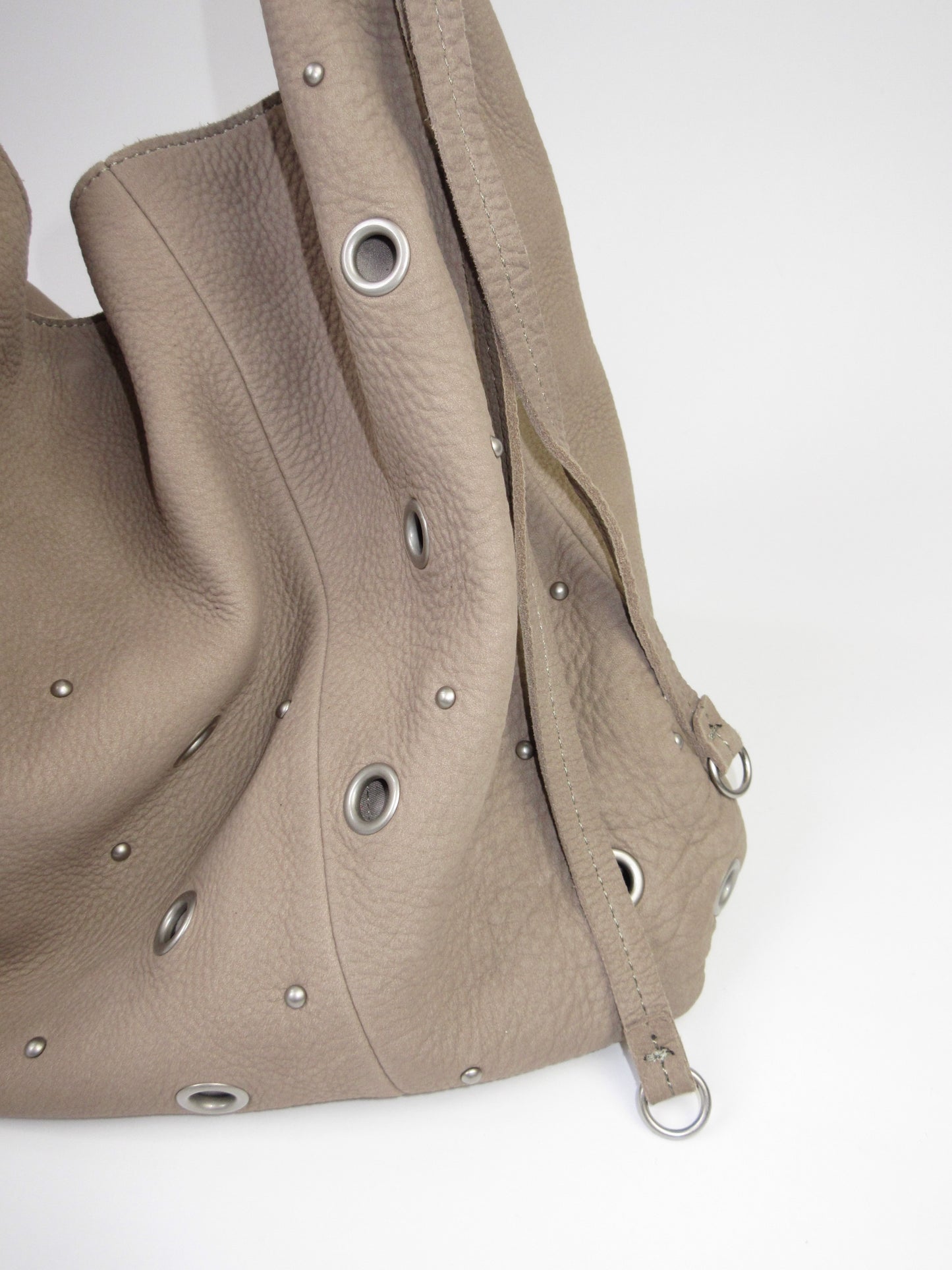 eyelet design leather bag