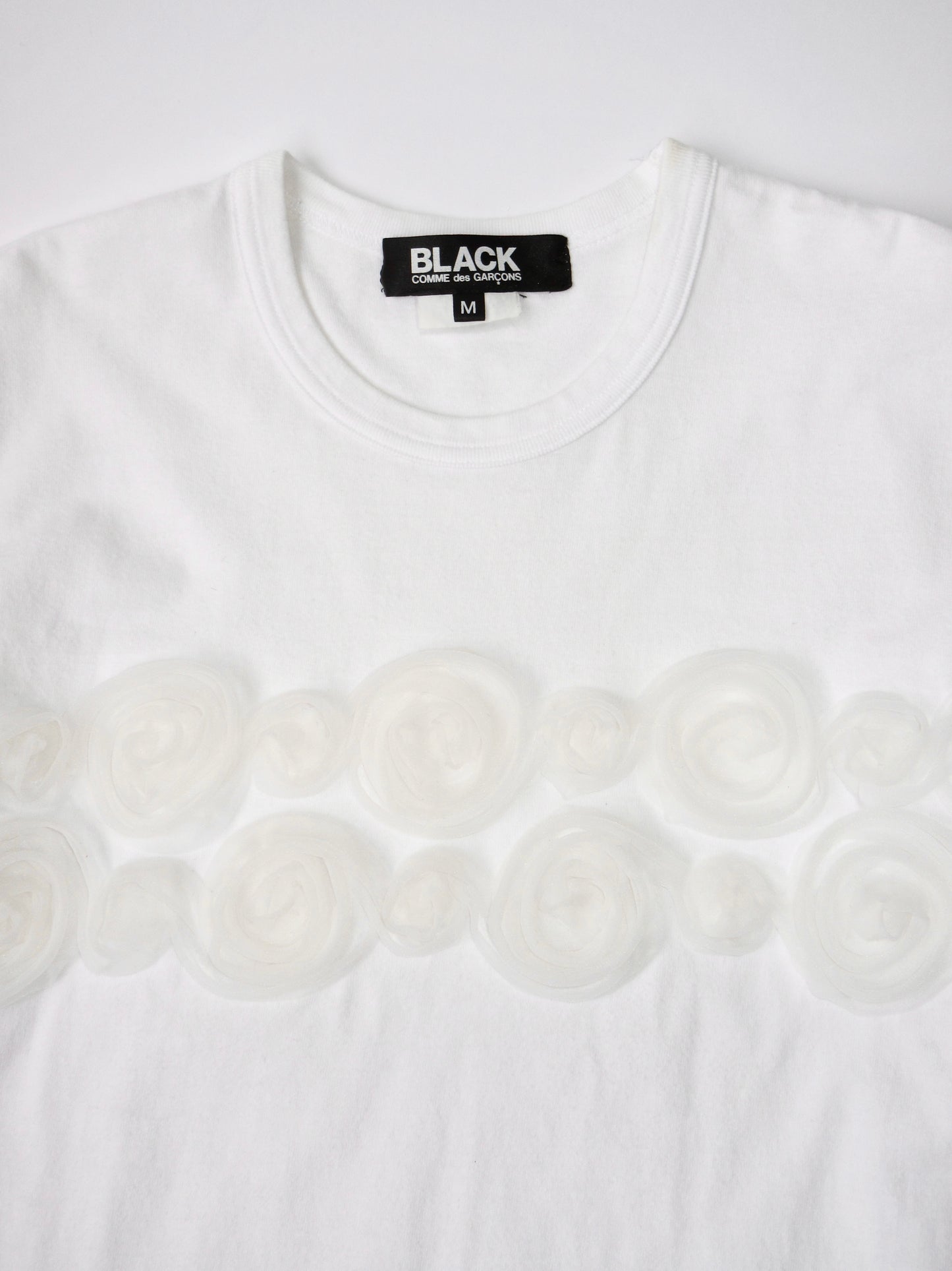 BLACK comme des garcons rose t-shirt