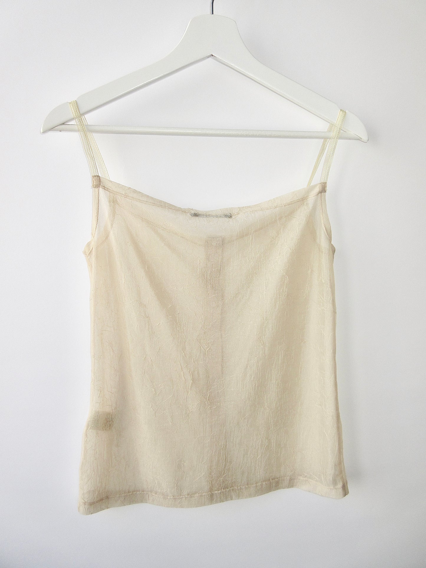 sheer sleeveless top